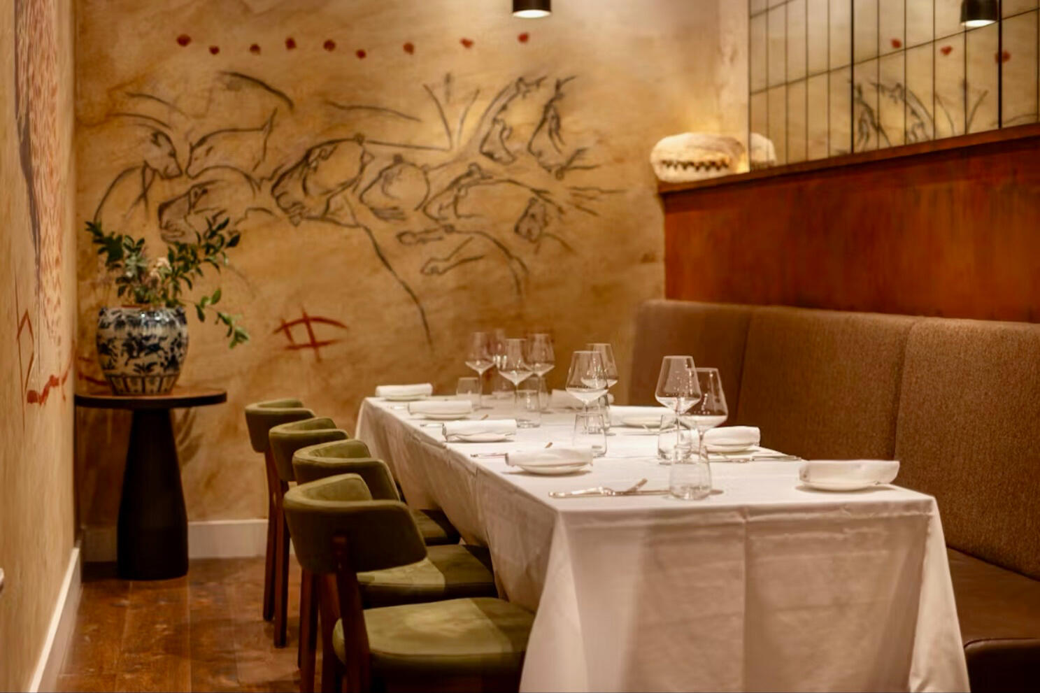 Cave art & rust wall - Origin City restaurant, London Cave art & rust wall - Origin City restaurant, London